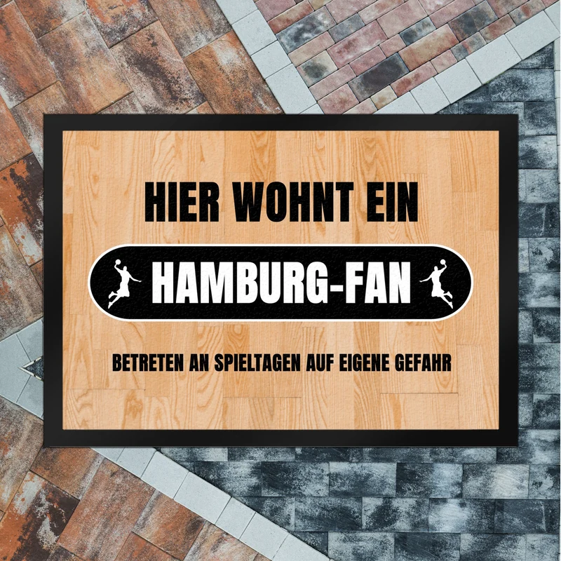 Hier wohnt ein Hamburg-Fan Fußmatte in 35x50 cm mit Turnhallenboden Motiv