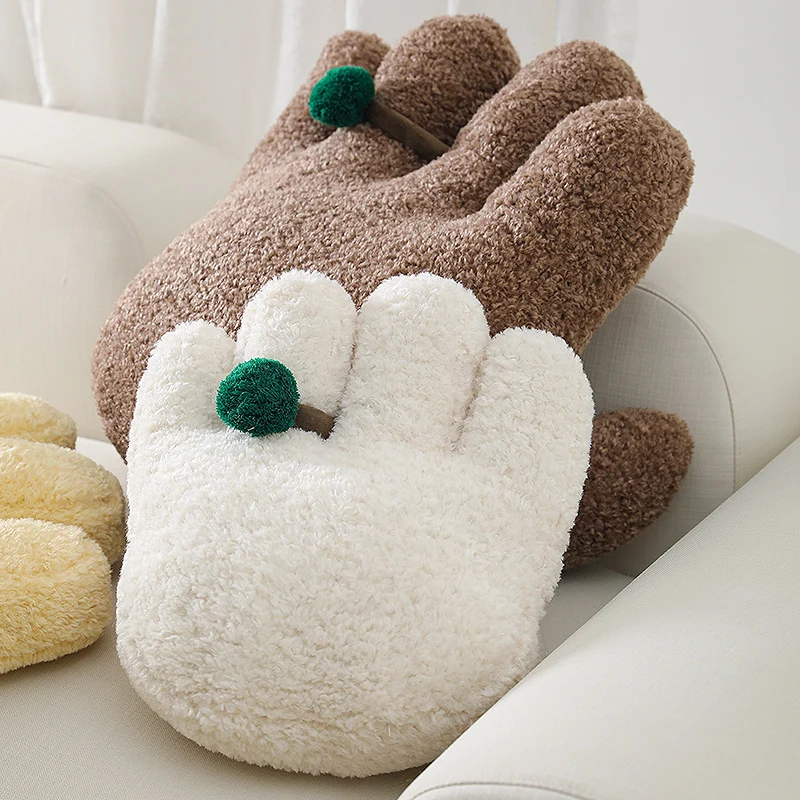 Plüsch-Dekokissen in Handform mit Pompon-Applikation Karnz