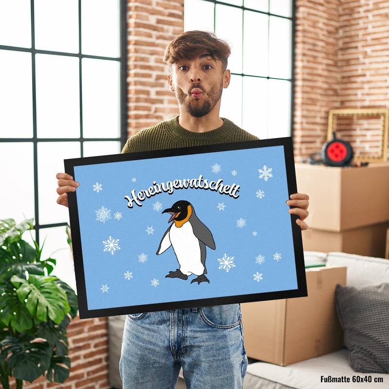Fußmatte mit niedlichem Pinguin-Motiv und Schneeflocken - Hereingewatschelt