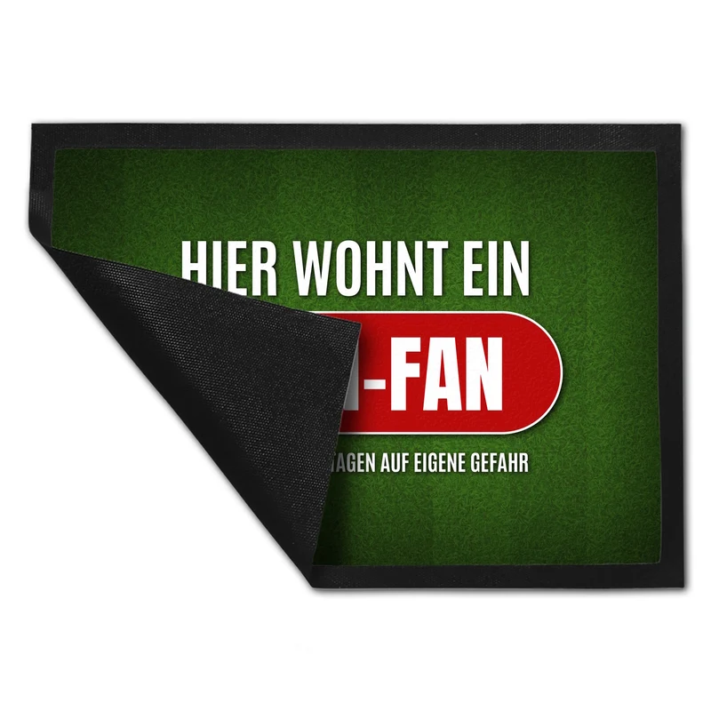 Hier wohnt ein Köln-Fan Fußmatte mit Rasen Motiv