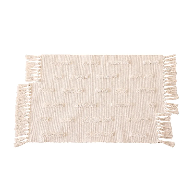 Gewebter Vorleger im Boho-Minimalstil mit kontrastiertem Tufting und Baumwollfransen Karnz