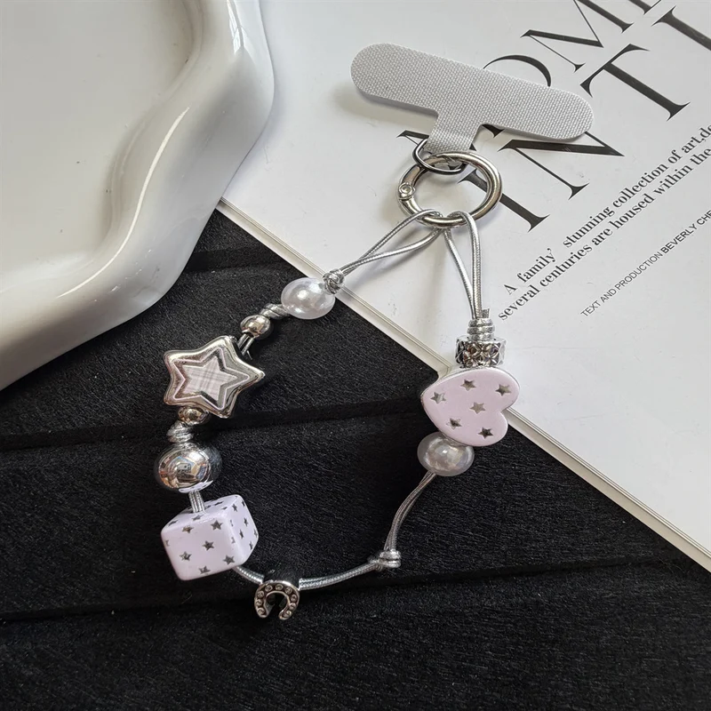 Dekorative Perlencharms-Handystrap Karnz