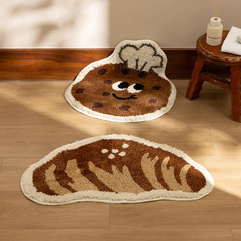 Badezimmer‑Badematten‑Set Karnz mit handgetuftetem Keks- und Brot‑Design, weichem Mikrofaser‑Flor und rutschfester Gummiunterseite