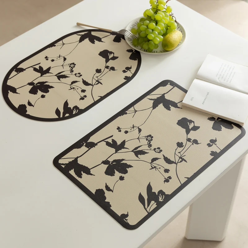 Abwischbare Tischsets aus PU‑Leder mit botanischem Silhouetten‑Design Karnz