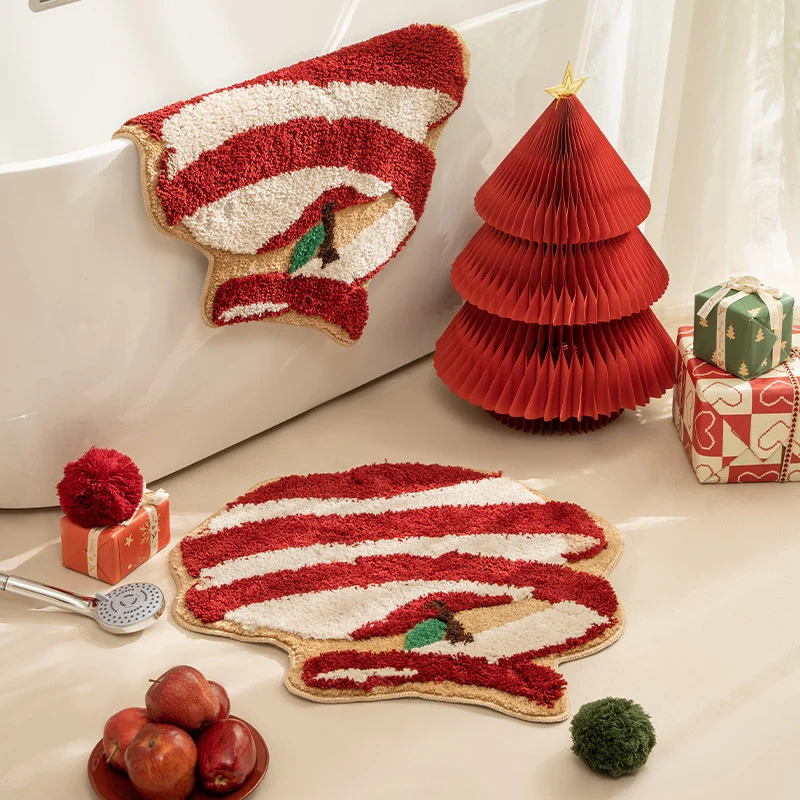 Hand-tufted decorative doormat in apple shape made of cotton blend with non-slip bottom Stornfield