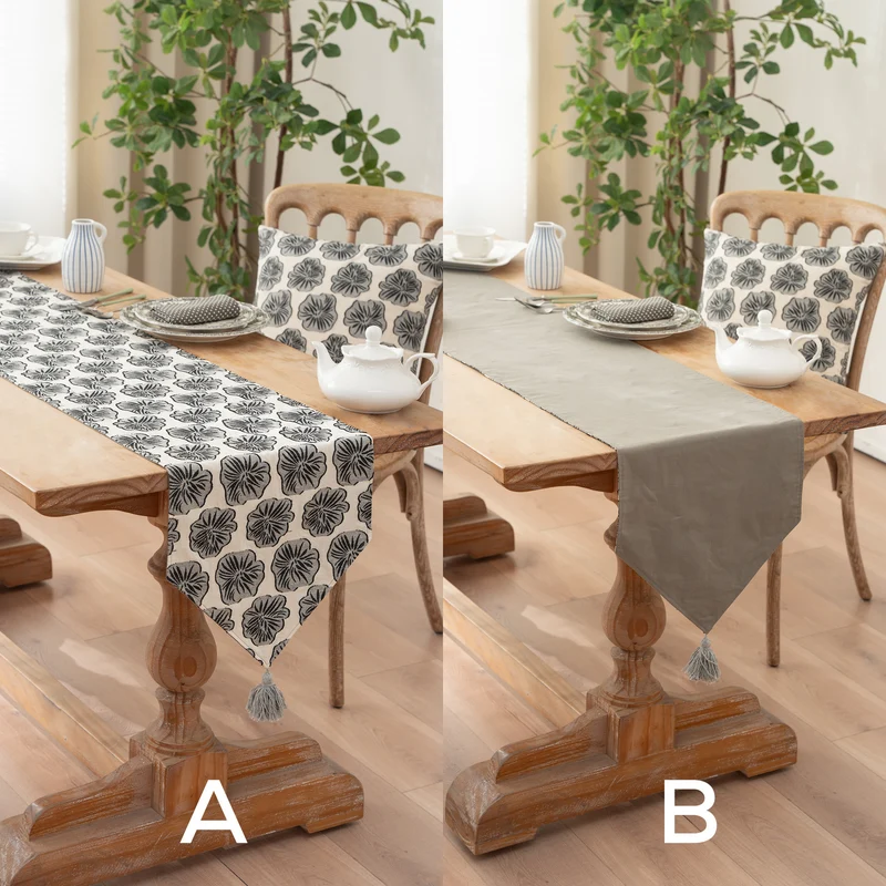 Woven double-sided linen table runner with tassels and hand-drawn swallow print Stornfield