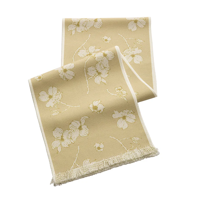 Woven table runner with floral jacquard pattern and fringed edge Stornfield