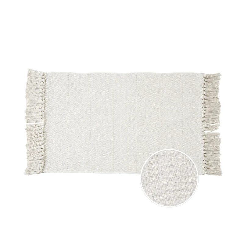 Woven table runner with dense herringbone jacquard and fringes Stornfield