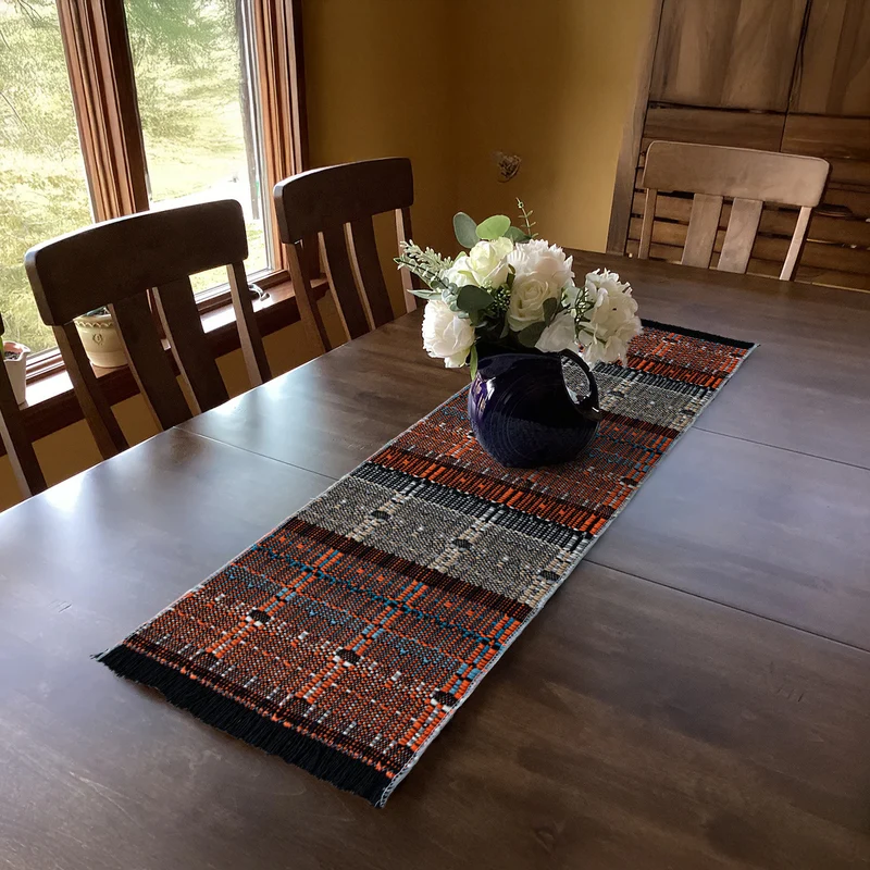 Woven table runner in ethnic look made of cotton blend with fringes Stornfield