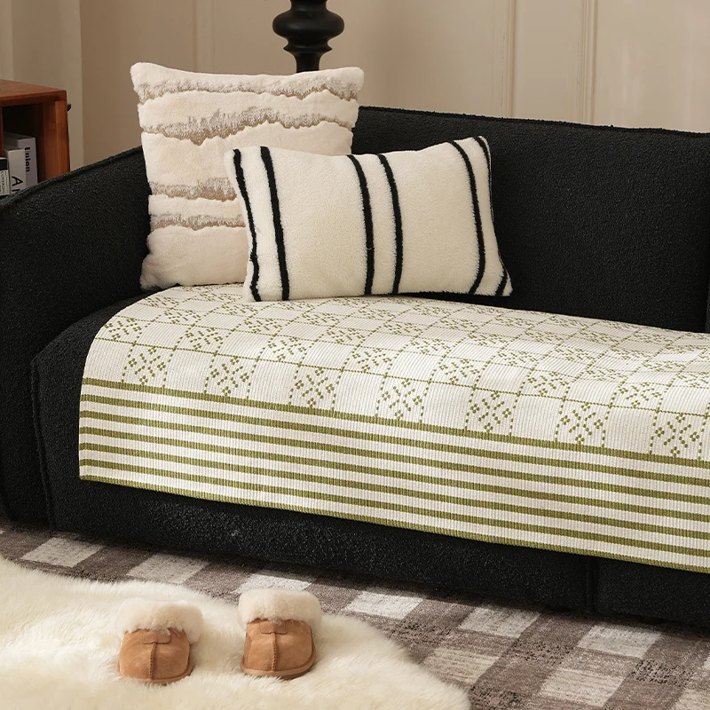 Woven rectangular table runner made of cotton blend with checkered pattern and striped border Stornfield