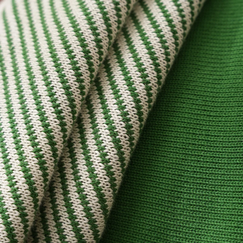 Woven cushion cover with checked jacquard relief and concealed zipper Stornfield
