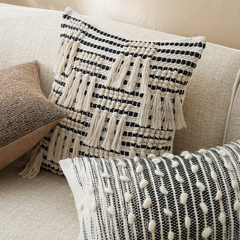 Woven decorative cushion cover with hand-tufted tassels and concealed zipper Stornfield