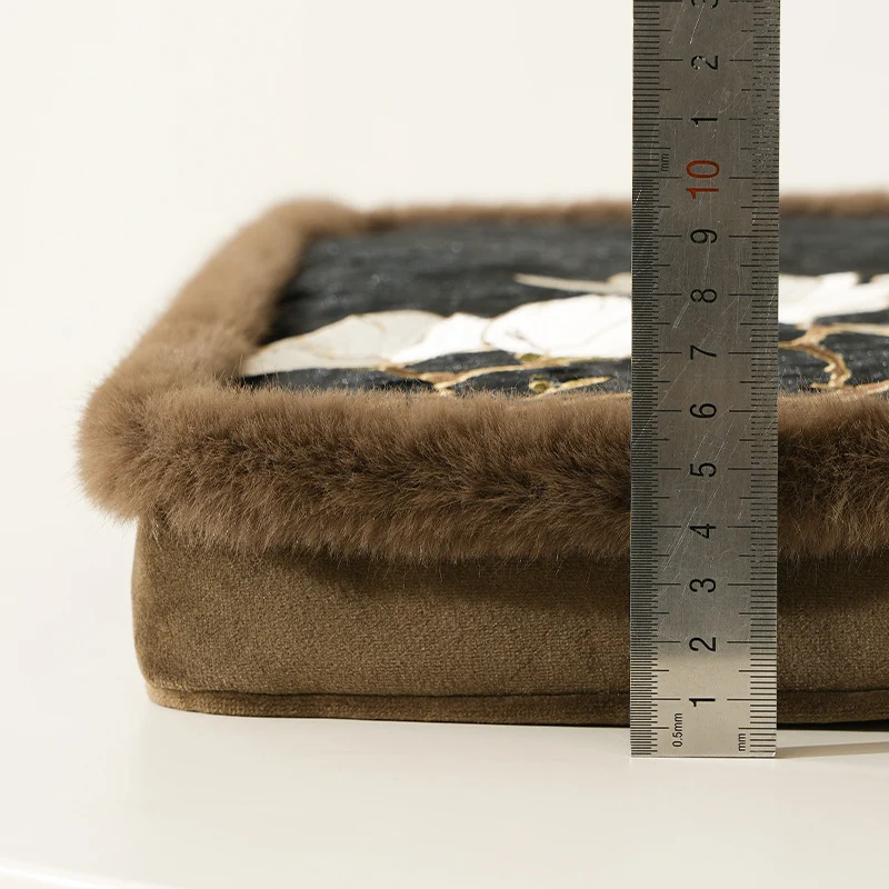 Padded seat cushion with velvet cover, floral embroidery and faux fur trim Stornfield