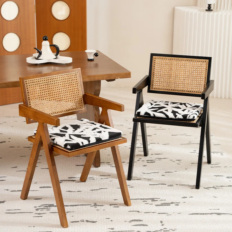 Padded seat cushion with hand-tufted leaf pattern and fastening ties Stornfield