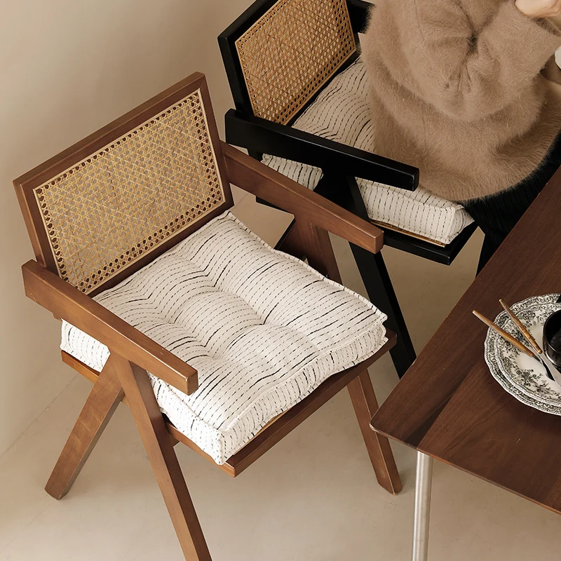 Padded square seat and floor cushion with quilted tufted padding and carrying handle Stornfield