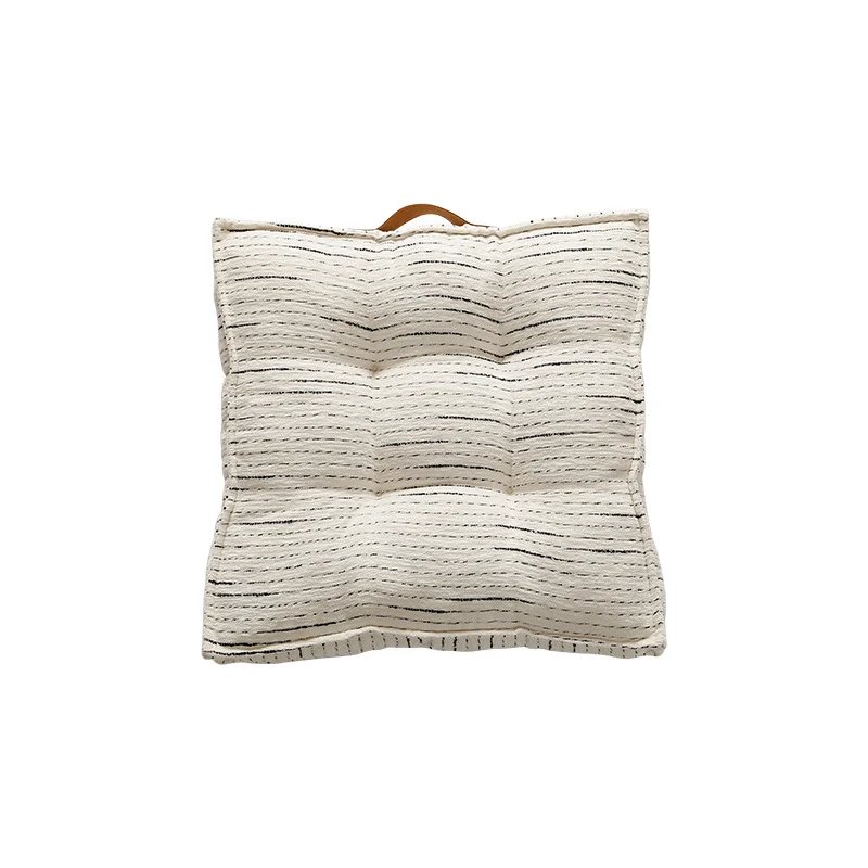 Padded square seat and floor cushion with quilted tufted padding and carrying handle Stornfield