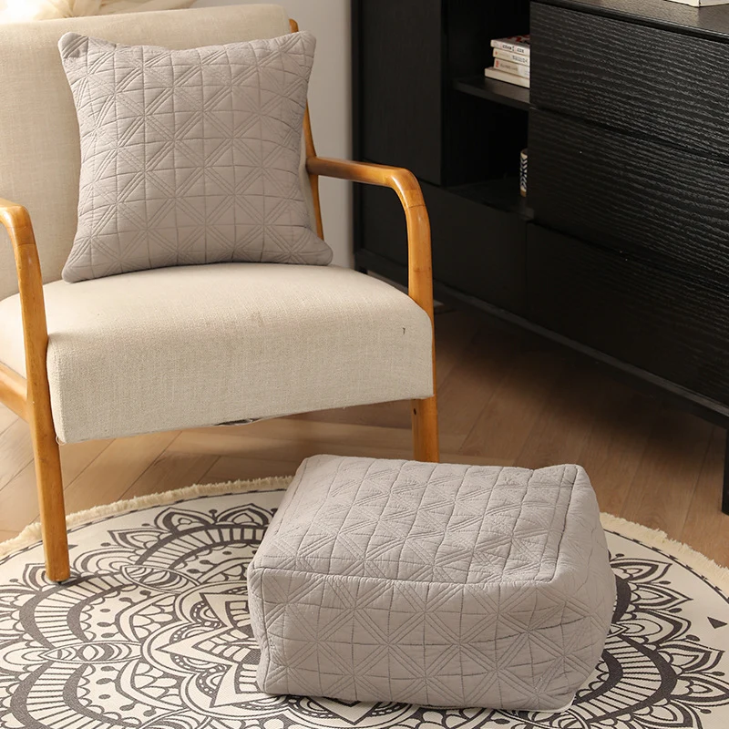 Padded floor seat pouf made of quilted cotton blend Stornfield