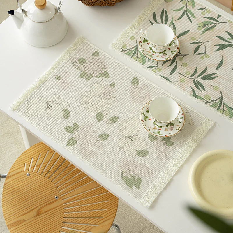Floral woven bath mat with decorative fringes Stornfield