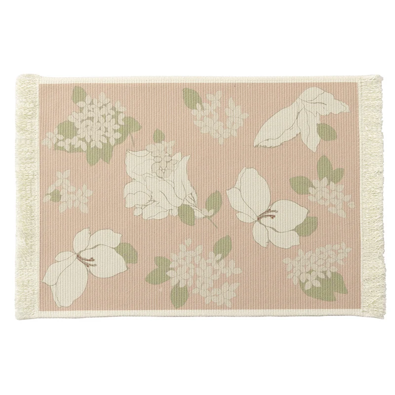 Floral woven bath mat with decorative fringes Stornfield