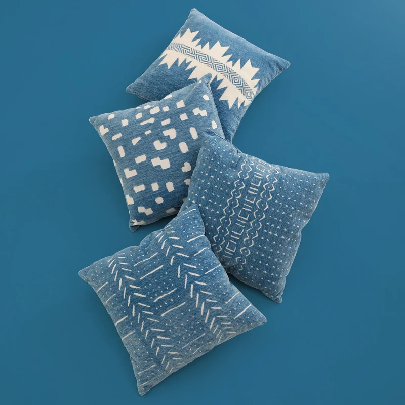 Woven pillow cover with geometric ethnic relief and textured tufting look Stornfield