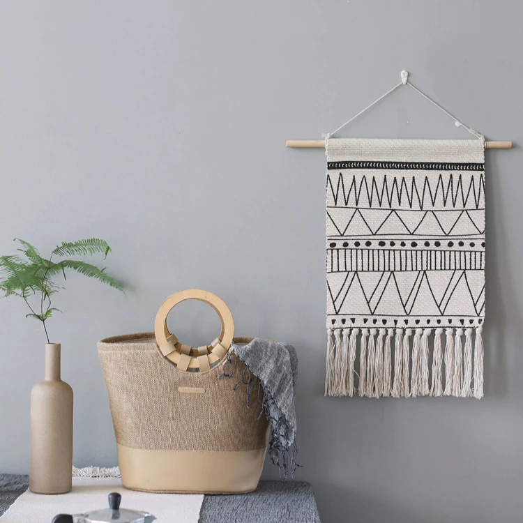 Woven Boho wall hanging with fringes and graphic ethnic pattern Stornfield