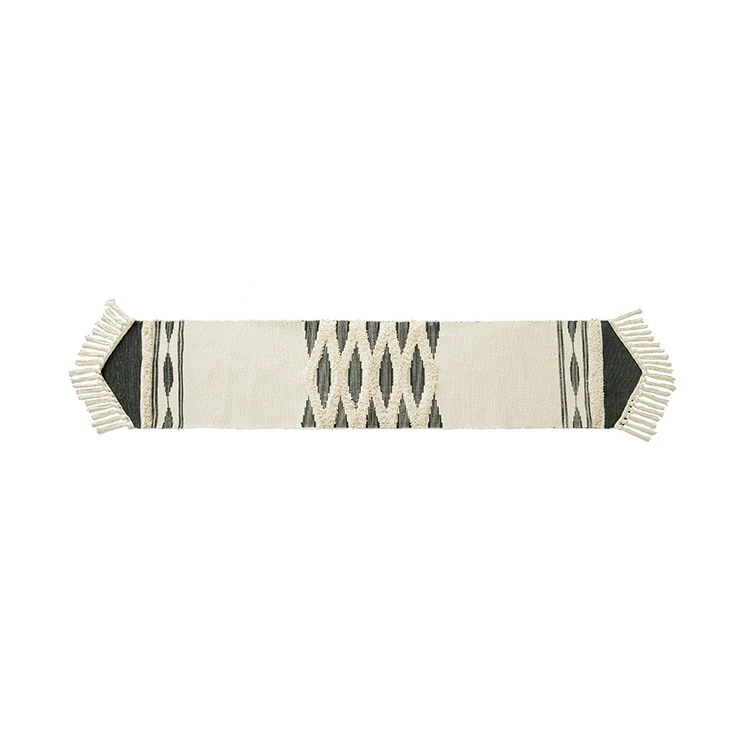 Woven Boho table runner with fringes and textured cotton look Stornfield