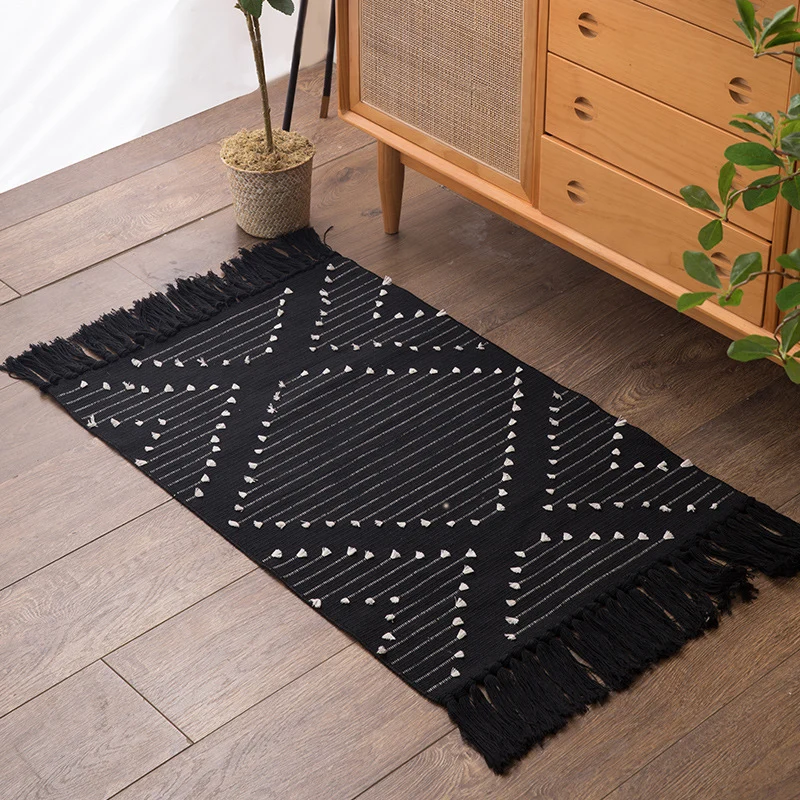 Woven cotton runner with diamond jacquard pattern and fringes Stornfield