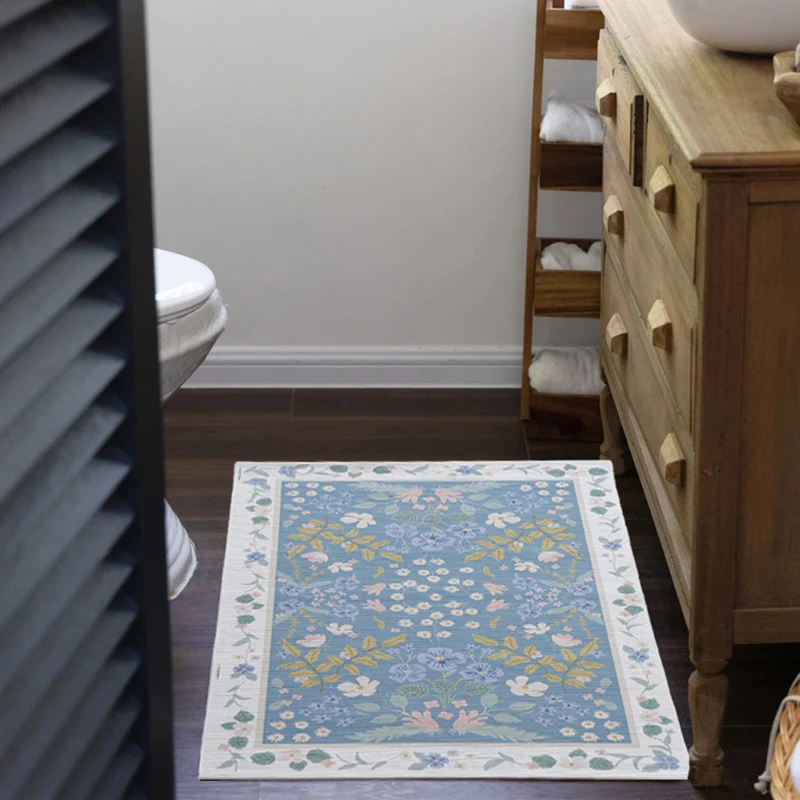 Woven cotton bath mat with floral allover jacquard pattern Stornfield