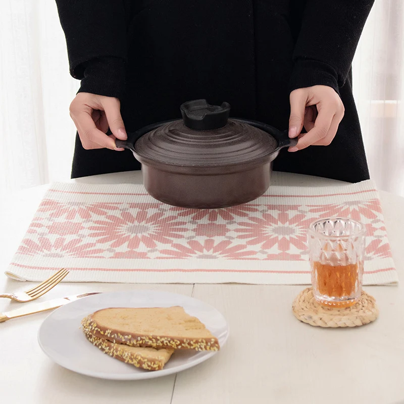 Woven placemat made of cotton blend with geometric diamond trim and fine texture Stornfield