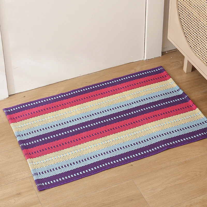 Striped cotton doormat with non-slip bottom and decorative woven edge Stornfield