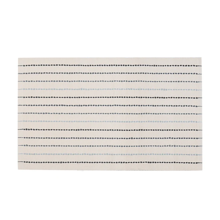 Striped cotton doormat with non-slip bottom and decorative woven edge Stornfield