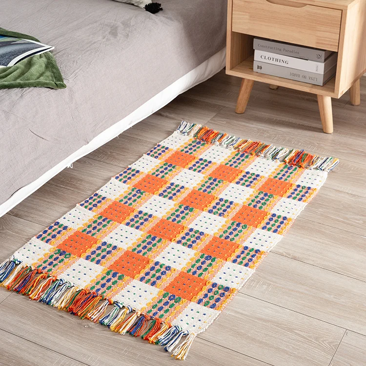 Striped cotton doormat with non-slip bottom and decorative woven edge Stornfield