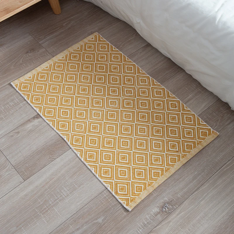 Striped cotton doormat with non-slip bottom and decorative woven edge Stornfield