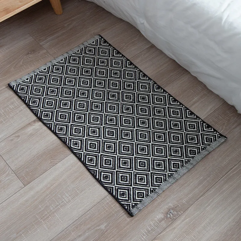 Striped cotton doormat with non-slip bottom and decorative woven edge Stornfield