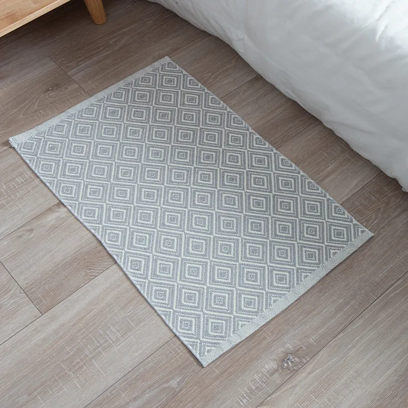 Striped cotton doormat with non-slip bottom and decorative woven edge Stornfield