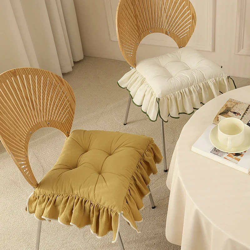 Padded chair cushion with ruffle and ties Stornfield