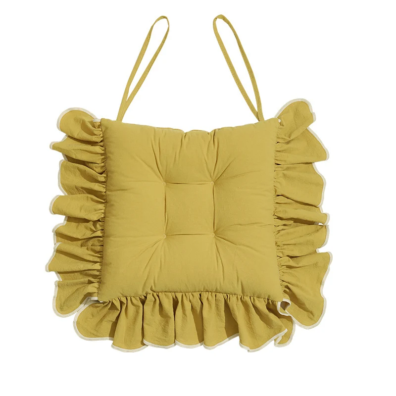 Padded chair cushion with ruffle and ties Stornfield