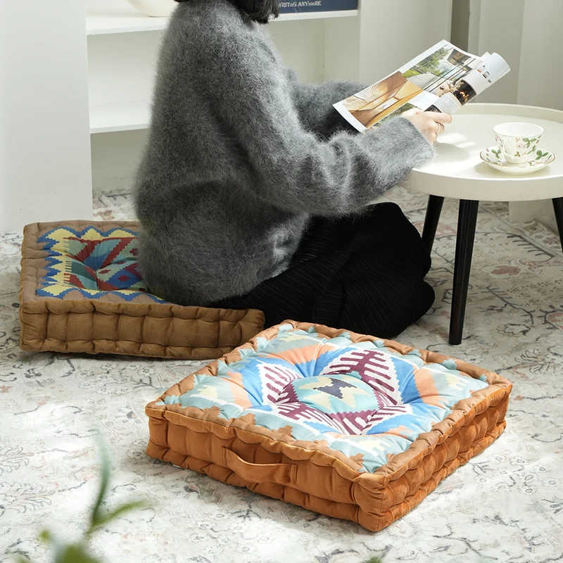 Padded seat and floor cushion with carrying handle and graphic ethno pattern Stornfield