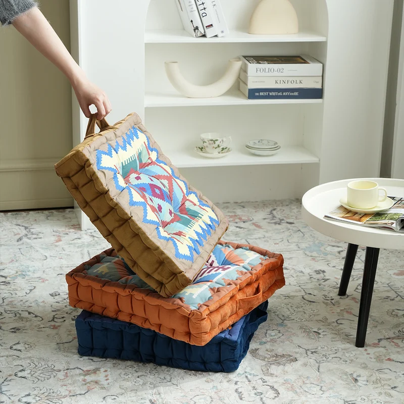 Padded seat and floor cushion with carrying handle and graphic ethno pattern Stornfield