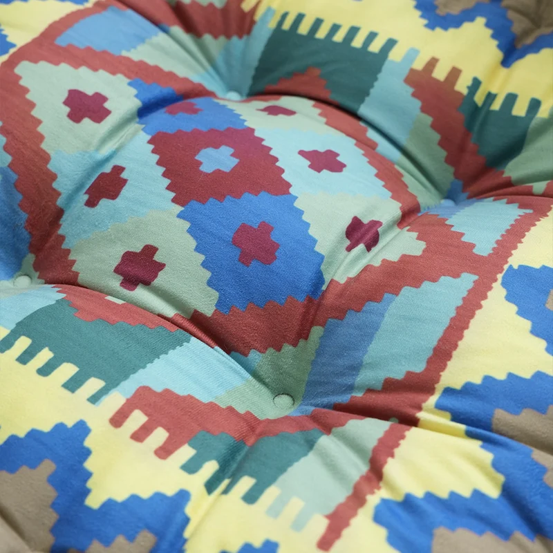 Padded seat and floor cushion with carrying handle and graphic ethno pattern Stornfield