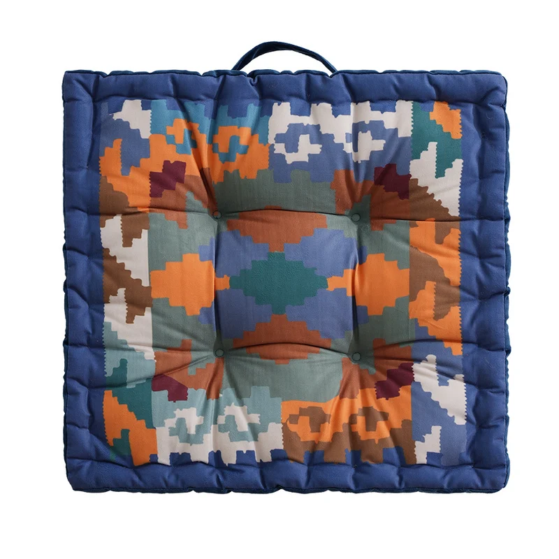Padded seat and floor cushion with carrying handle and graphic ethno pattern Stornfield
