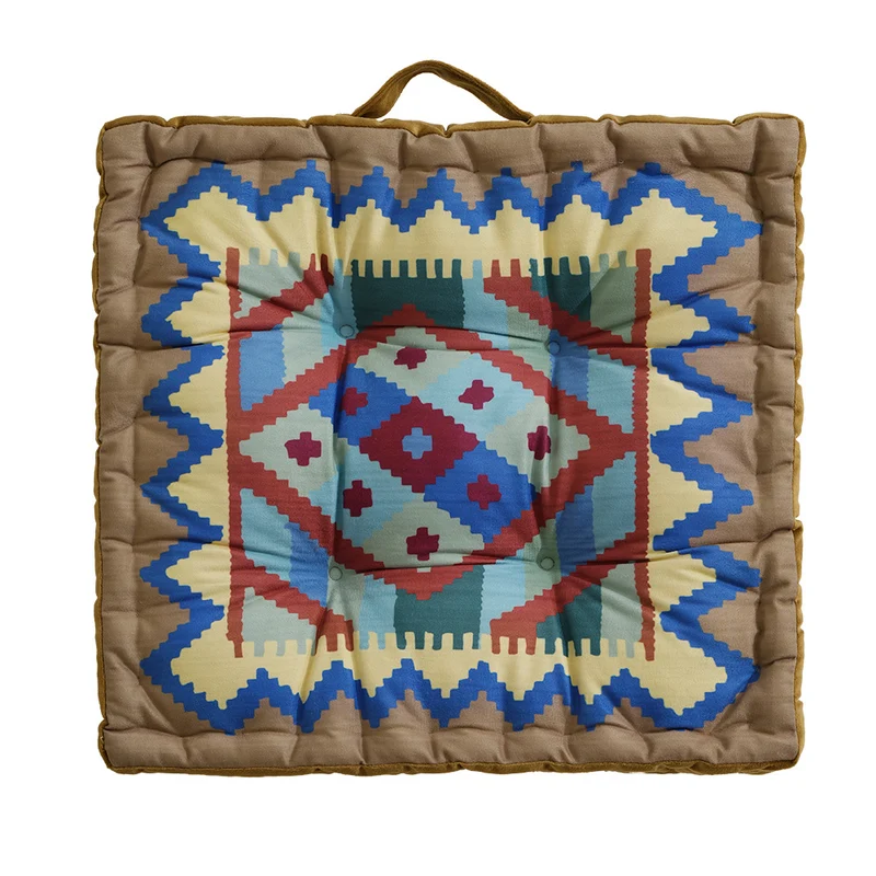 Padded seat and floor cushion with carrying handle and graphic ethno pattern Stornfield