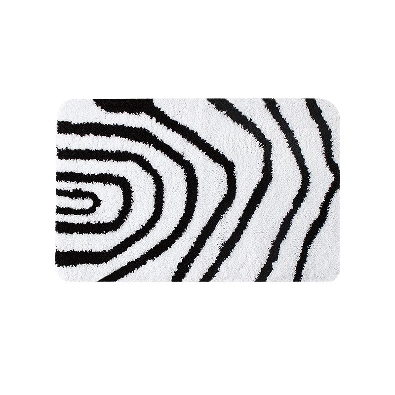 Fluffy bath mat in a graphic wave relief with anti-slip base Stornfield