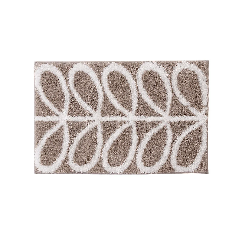 Fluffy bath mat in a graphic wave relief with anti-slip base Stornfield