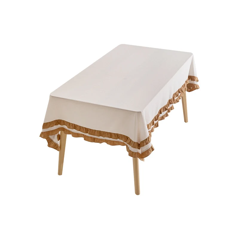 Round tablecloth with quilted textured relief and double-layered ruffle Stornfield