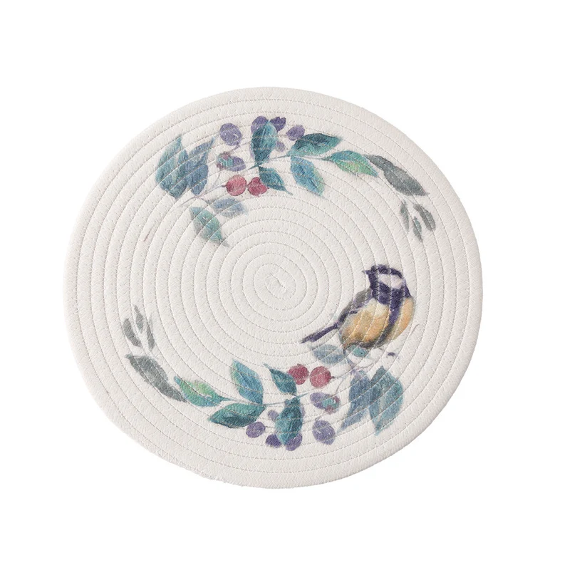 Round placemat made of woven cotton with a cute rhinoceros illustration and floral wreath Stornfield