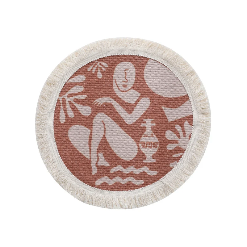 Round woven placemat with fringes and abstract figure motif Stornfield