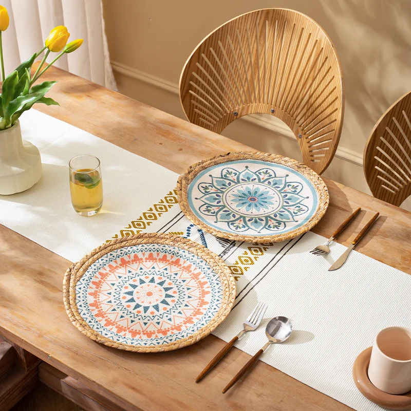 Round woven table mat made of jute with mandala cotton overlay Stornfield