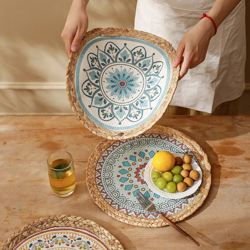 Round woven table mat made of jute with mandala cotton overlay Stornfield