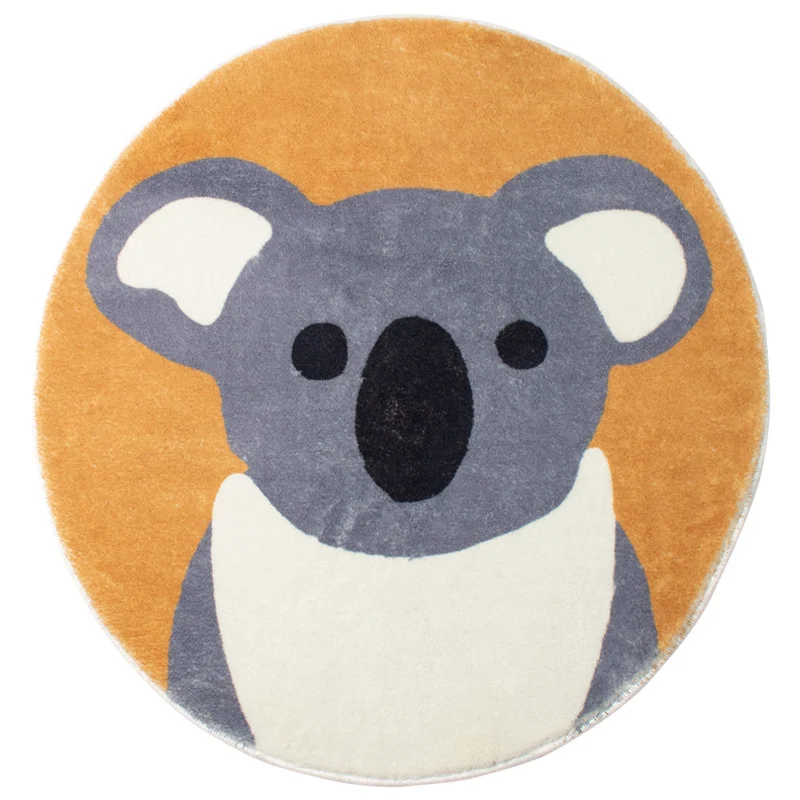 Round living room rug with graphic diamond pattern and soft short pile Stornfield